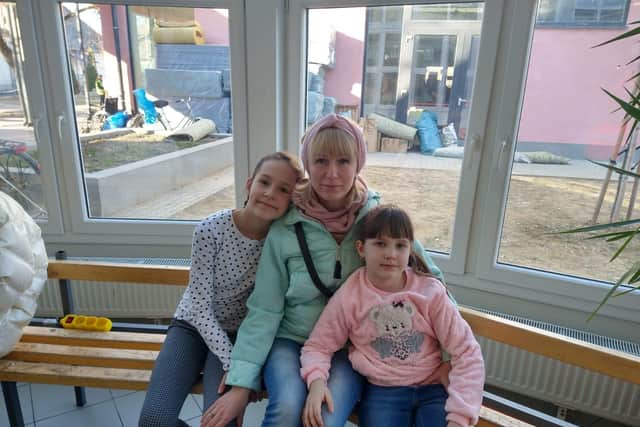 Tatyana and her daughters, who are incredibly grateful for Pam's donation.