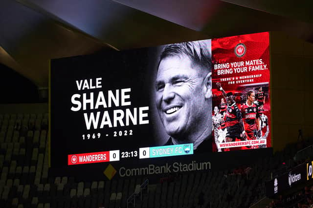 A Shane Warne tribute is pictured on the big screen during the round 17 A-League Men's match between Western Sydney Wanderers and Sydney FC at CommBank Stadium, on March 05, 2022, in Sydney, Australia. (Photo by Brett Hemmings/Getty Images)
