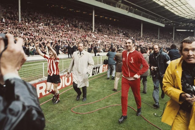 Bobby Kerr and Bob Stokoe salute the travelling Sunderland support - who backed their team superbly well.