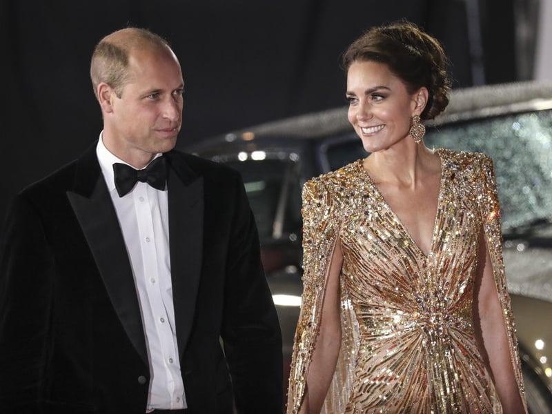 Britain's Prince William, left, and his wife Kate the Duchess of Cambridge arrive for the World premiere.