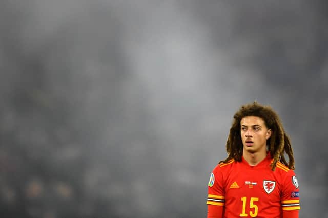 Ethan Ampadu of Wales looks on as flares are set off in the crowd behind him during the UEFA Euro 2020 qualifier between Wales and Hungary so at Cardiff City Stadium on November 19, 2019 in Cardiff, Wales. (Photo by Harry Trump/Getty Images)