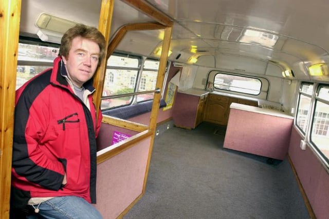 Area youth worker Steve Wilson on a bus which had been coverted for Doncaster Youth Service to travel to local villages and host activities. 2001.