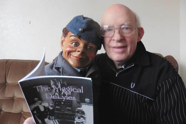 Winnie's ventriloquist doll Jimmy with David Monks and the Magical DeLyles book
