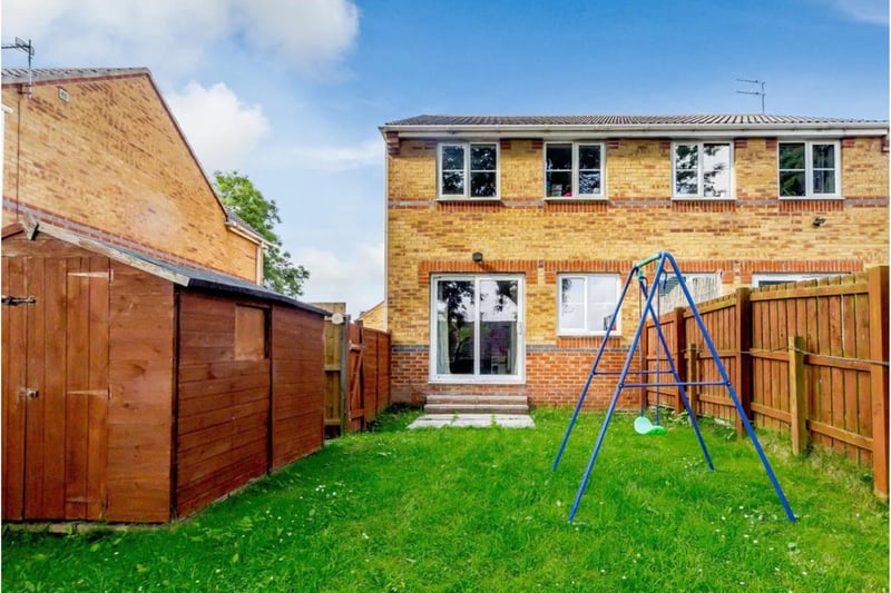 This property boasts an extensive rear garden with a garden shed and ample lawn, perfect for enjoying the summer months.