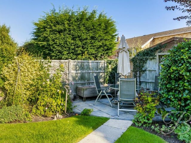 Tucked away in the far corner of the back garden is this delightful area where you could set up a table and some chairs. An ideal spot for a glass of wine or a cup of coffee.