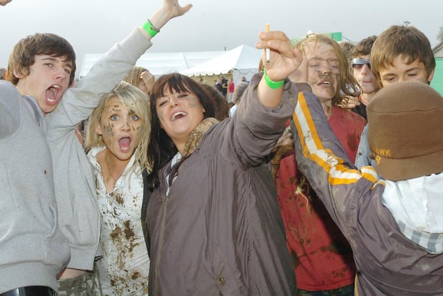 The soggy weather did not deter these 2008 festival goers.