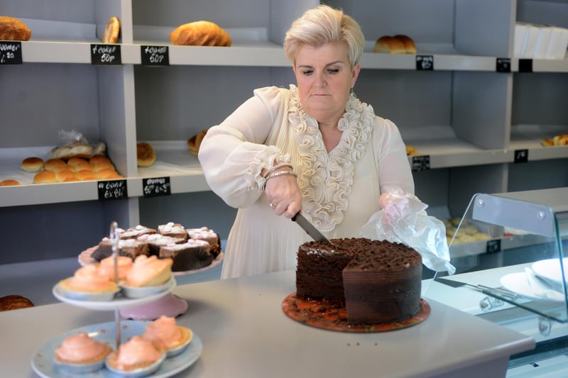 Judith Thompson cuts a slice of chocolate cake at The Pantry in Whitburn in 2014.