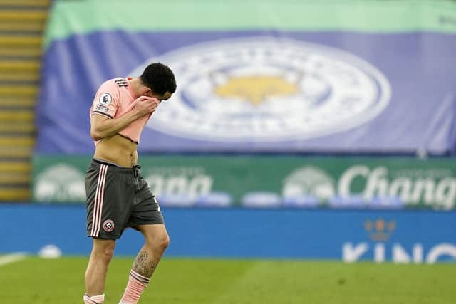 Kean Bryan of Sheffield Utd looks on dejected at the final whistle during the Premier League match at the King Power Stadium, Leicester. Picture date: 14th March 2021. Picture credit should read: Andrew Yates/Sportimage