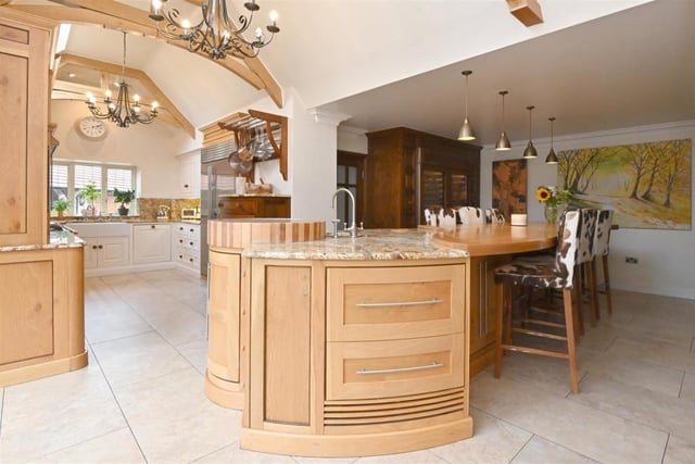 This beautiful modern kitchen is just a short trip away from almost every part of the house. It's very accessible meaning you just need to take a couple minutes out to prepare your favourite snack to take back to one of the many areas to relax.