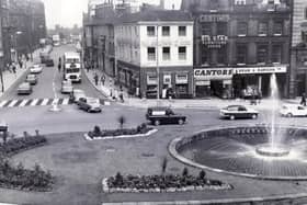 A view of the Goodwin Fountain and flower beds at the top of Fargate, taken from Sheffield Town Hall - 10th August 1967.