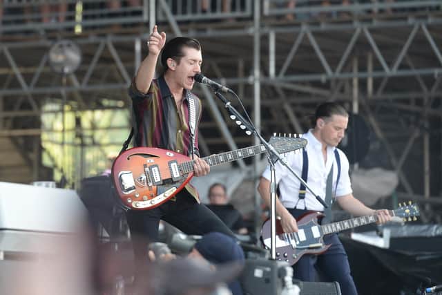 MANCHESTER, TN - JUNE 15:  Alex Turner of the Arctic Monkeys performs during the 2014 Bonnaroo Music & Arts Festival on June 15, 2014 in Manchester, Tennessee.  (Photo by Jason Merritt/Getty Images)