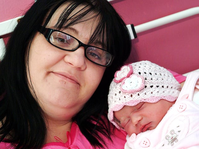 Michelle Homer, of Sutton, with her New Years' Day baby, as yet un-named, born at 7.40pm a daughter for partner Joe Young and sister to Jamie and Jason.