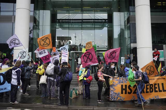 Extinction Rebellion and HS2 Rebellion protesters gather outside the HS2 headquarters in Birmingham in August
