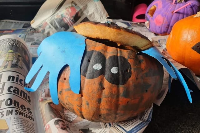 Six-year-old Olly painted this pumpkin as a peek a boo. Shared by Alicia Baker.