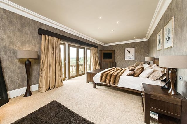 The sumptuous principal bedroom suite has a dressing room with fitted wardrobes and dressing table and full height windows offering staggering southerly views of the valley. All five bedrooms on the first floor of the property have en-suite facilities.