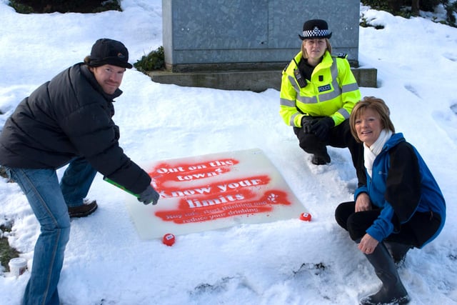 Caption: (r-l) Councillor Cynthia Ransome, Acting Police Sergeant Louise Lambert and Manou Benden from Reverse Graffiti demonstrate the snow graffiti used at Doncaster College in December 2010