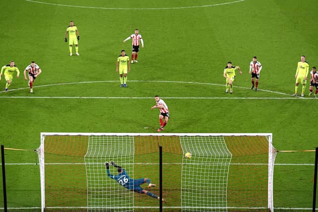 Sheffield United's Billy Sharp scores the winner from the penalty spot in the 1-0 victory over Newcastle United at Bramall Lane last night. Photo: Stu Forster/PA Wire.