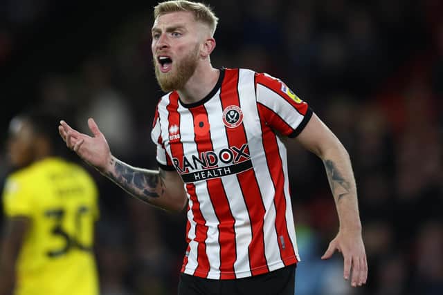 Oli McBurnie has been told he should complete his coaching badges by Sheffield United's Jack Lester and manager Paul Heckingbottom: Darren Staples / Sportimage