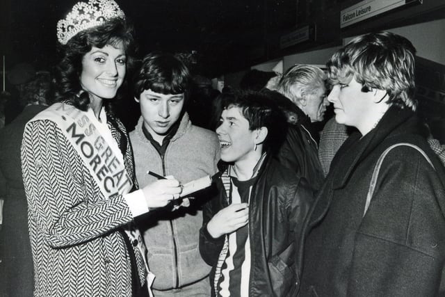 The north of England's largest holiday and travel exhibition sponsored by Sheffield Newspapers was held at the Cutler's Hall, Sheffield from 1983 to 1990. Here, Miss Great Britain Jill Saxby signs autographs for admiring young fans at the 1985 exhibition