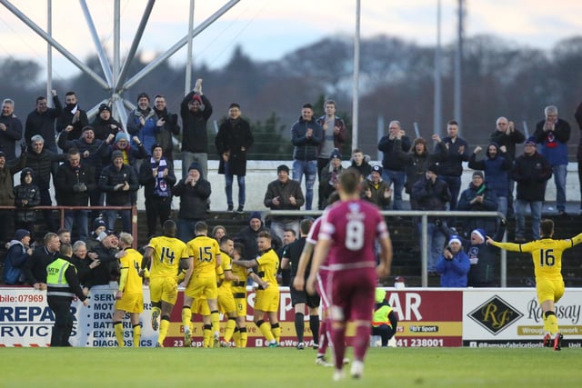 Raith players and fans celebrate in December 2018 as Liam Buchanan scores in a 2-0 win.