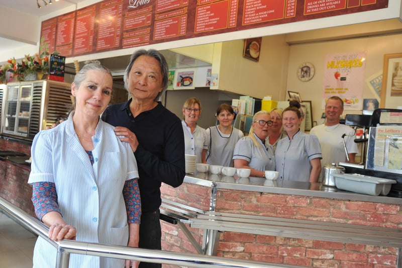 Retiring Maria and Stephen Lee with staff at Louis Cafe in 2018.