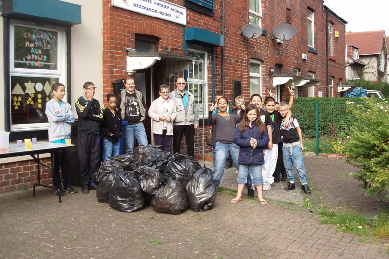 Pictured are residents who gathered 30 bags of rubbish on litter pick around the Flower Estate, Firth Park back in 2013