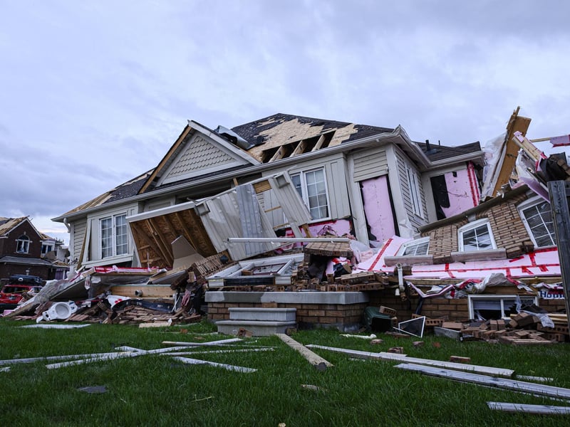Damage left after a tornado touched down in a neighborhood of Barrie, Ontario, on Thursday, July 15, 2021. (Christopher Katsarov/The Canadian Press via AP)