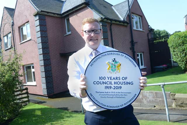 Rotherham Council's Cabinet Member for Housing, Councillor Dominic Beck unveiling a plaque on the borough’s first ever council house to celebrate 100 years of council housing