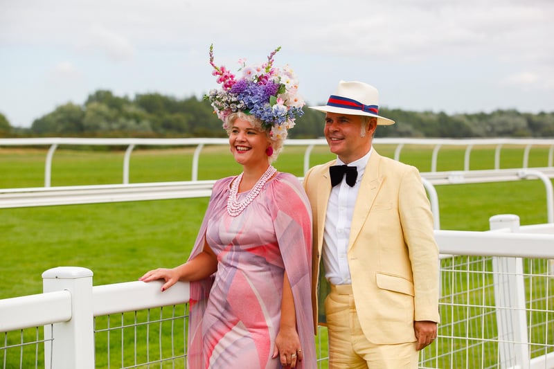Fashion judges Zara and Alistair Morris from Edinburgh showed the attendees how its done with their bold and iconic look at Friday's event. Representing the pastel palette with hints of floral, the pair expertly complimented the racecourse scene of green and white.