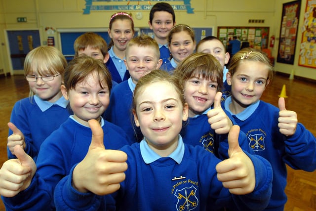 Pupils had plenty of reason to smile after the school got a great Ofsted report 11 years ago. Is there someone you know in the photo?