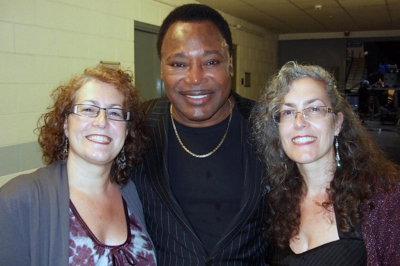 George Benson with Star meet and greet winner Karen Wilkinson, left, and twin sister guest, Julie Varley, backstage at Sheffield Arena in 2010.