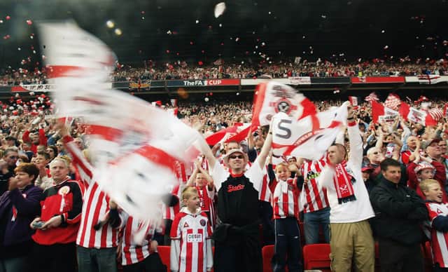 Sheffield United fans during the FA Cup semi-final match against Arsenal at Old Trafford in April 2003. (Photo by Laurence Griffiths/Getty Images)