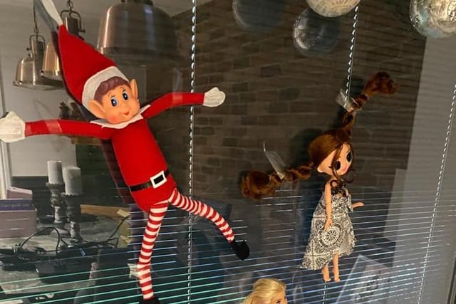 Angie Jones stuck the elf to the wall in a game of The Floor is Lava.