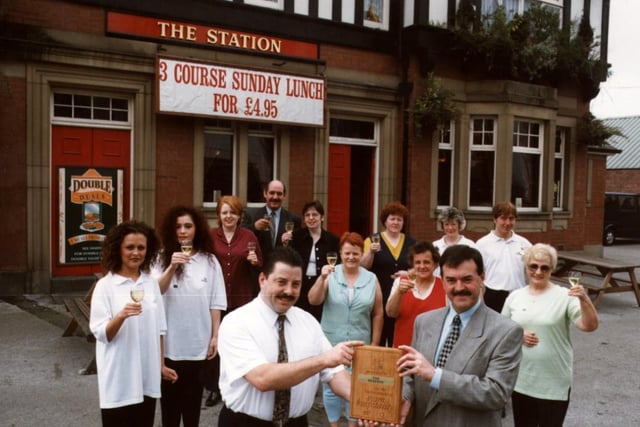Whitbread Sherwood Inns Operation Manager Phil Bromley presented licensee Robert Spencer and his team with a Hospitality Award in 1997