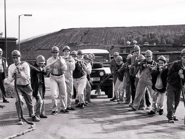 Staff from Henry Boot Limited take part in a sponsored truck pull, August 20, 1990
