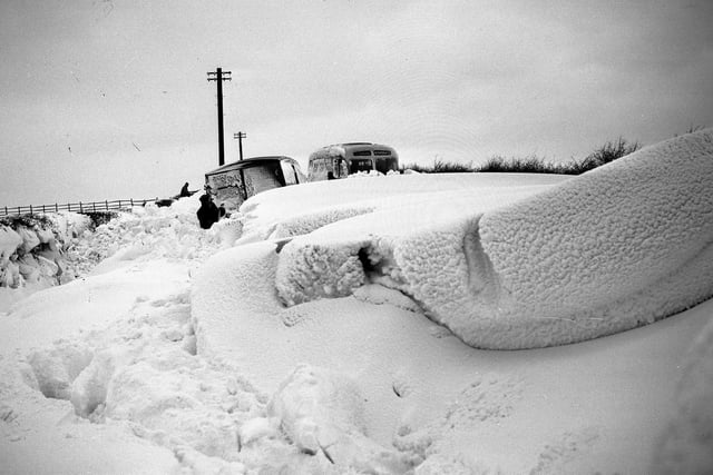 Back in 1963, the snow was lying 10ft deep in places and this photo shows a bus and a van which had been stuck in the drifts for days.