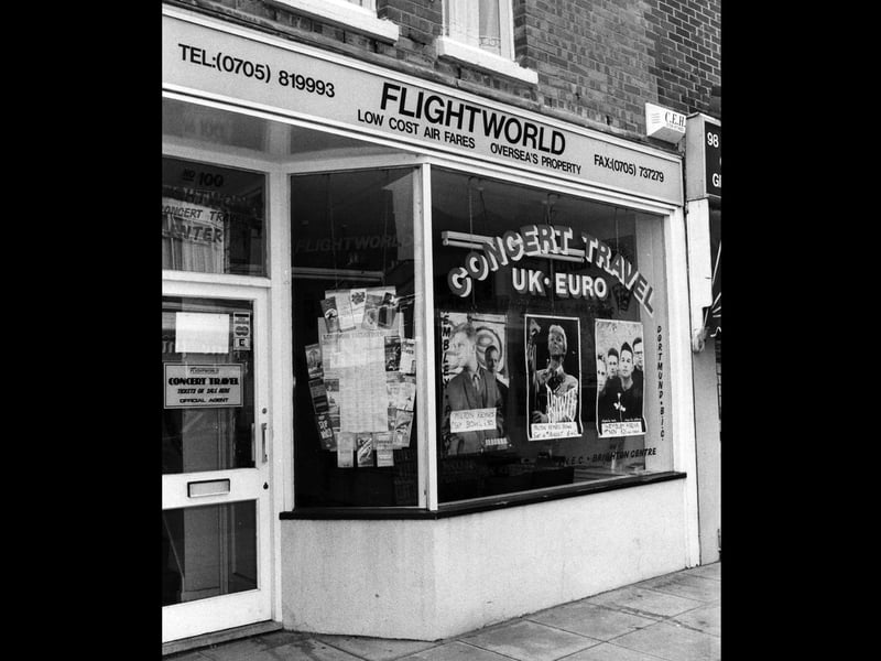 Flightworld Travel Agents and Concert Travel, Fawcett Road, ceased trading, image taken 7th August 1990. They were offering trips to see Depeche Mode, David Bowie and Erasure at Milton Keynes and Wembley.