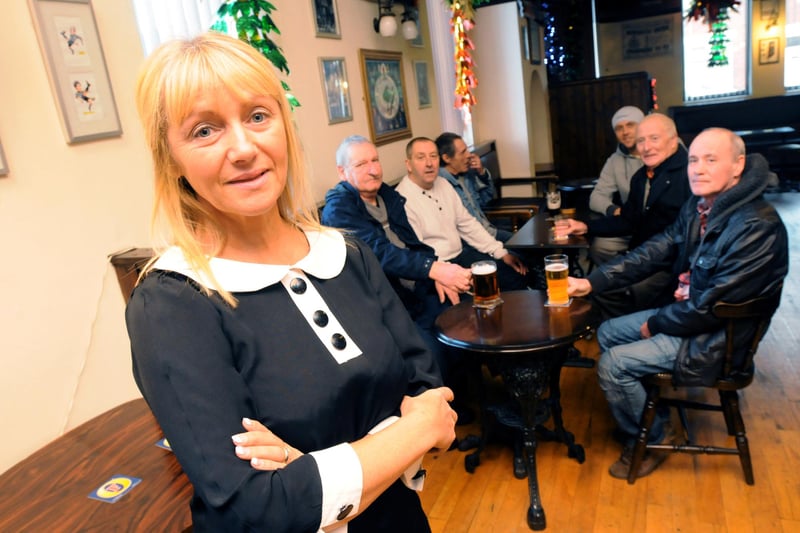 The Roadhouse pub manager Tracey Nesbitt with pub regulars 7 years ago.