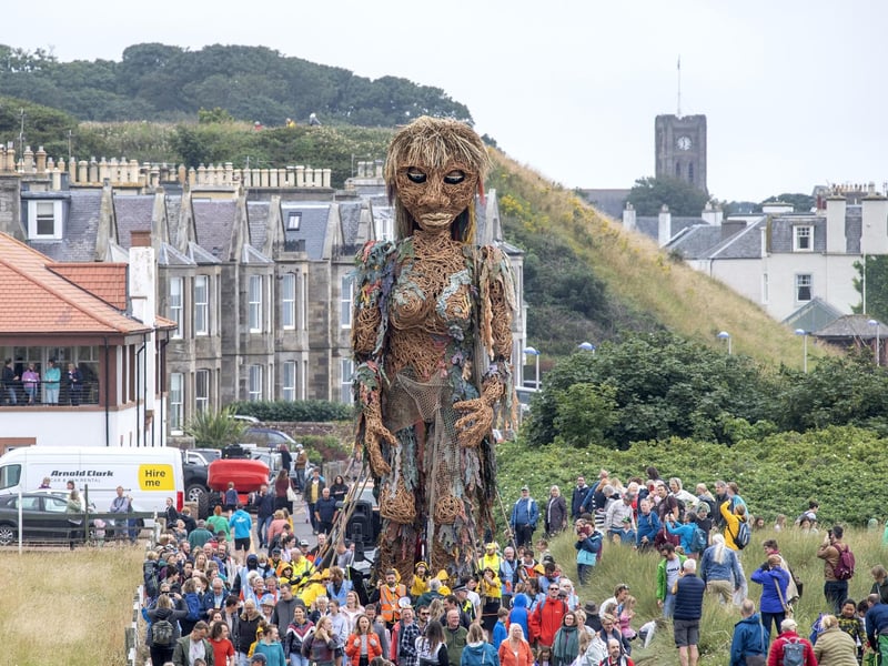 She makes her way along the seafront at North Berwick, East Lothian, during a performance at the Fringe By The Sea festival.