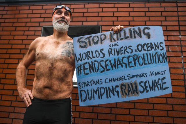 Swimmer Peter Green is seen protesting outside the entrance to the COP26 site on November 12, 2021