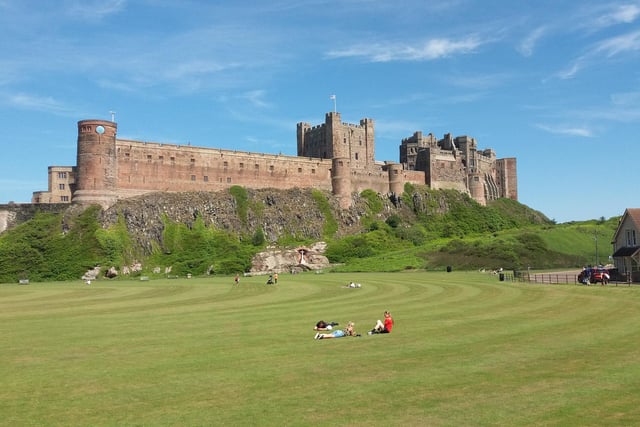 Relaxing on Bamburgh's village green next to the castle.