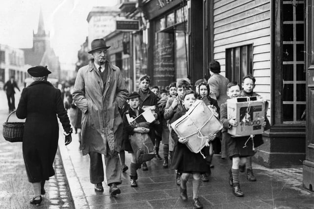Youngsters collect waste paper in Gosport in January 1942 1940. The News PP496
