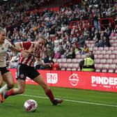 Leighanne Robe of Liverpool  challenges Lucy Watson of Sheffield United during the The FA Women's Championship match at Bramall Lane. Darren Staples / Sportimage