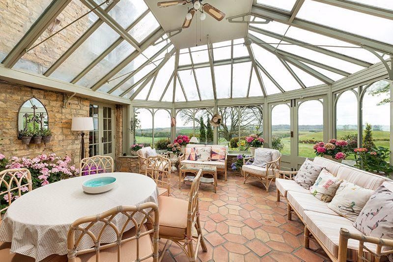 Sanderson Young says the propertt has an "impressive Amdega conservatory" which offers views across the landscape.