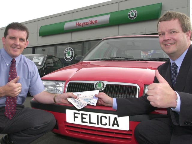 St John's Hospice has been presented with a £1,000 by car dealers Hayselden in 2000. Our picture shows multi-franchise sales manager Colin Meakin (left) handing over cheques totalling £1,000 to Peter Mellor, treasurer of the Doncaster Cancer Detection Trust, outside the company's Doncaster Skoda dealership.