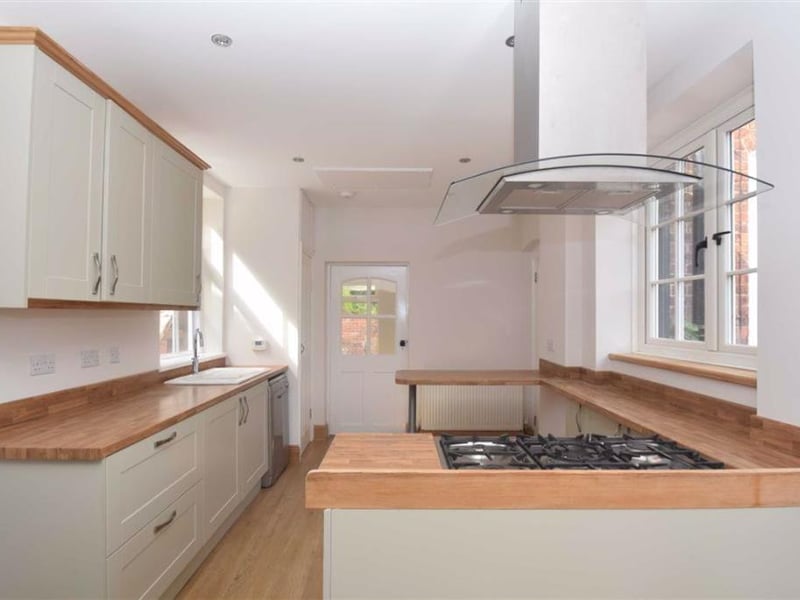 A well appointed and surprisingly spacious ground-floor apartment.
