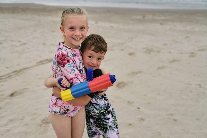 Alison Rooney photographed her children still enjoying the beach at 9.30pm.