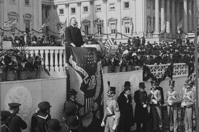 US President Theodore Roosevelt (1858 - 1919) makes his inaugural address at the start of his second term, at the East Portico of the United States Capitol in Washington, DC, 4th March 1905. His speech includes the words 'We wish peace because it is right'.