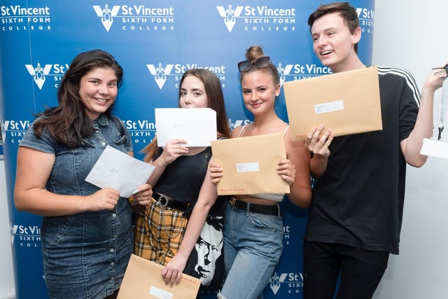 Hannah Norbury, Georgina Brookes Armani Fielding, Elijah Morling with their results at St Vincents College. Picture: Keith Woodland