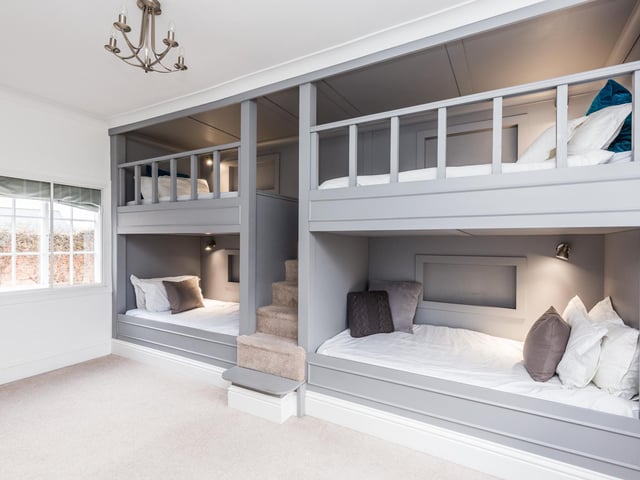 This bedroom has fitted bunk beds.